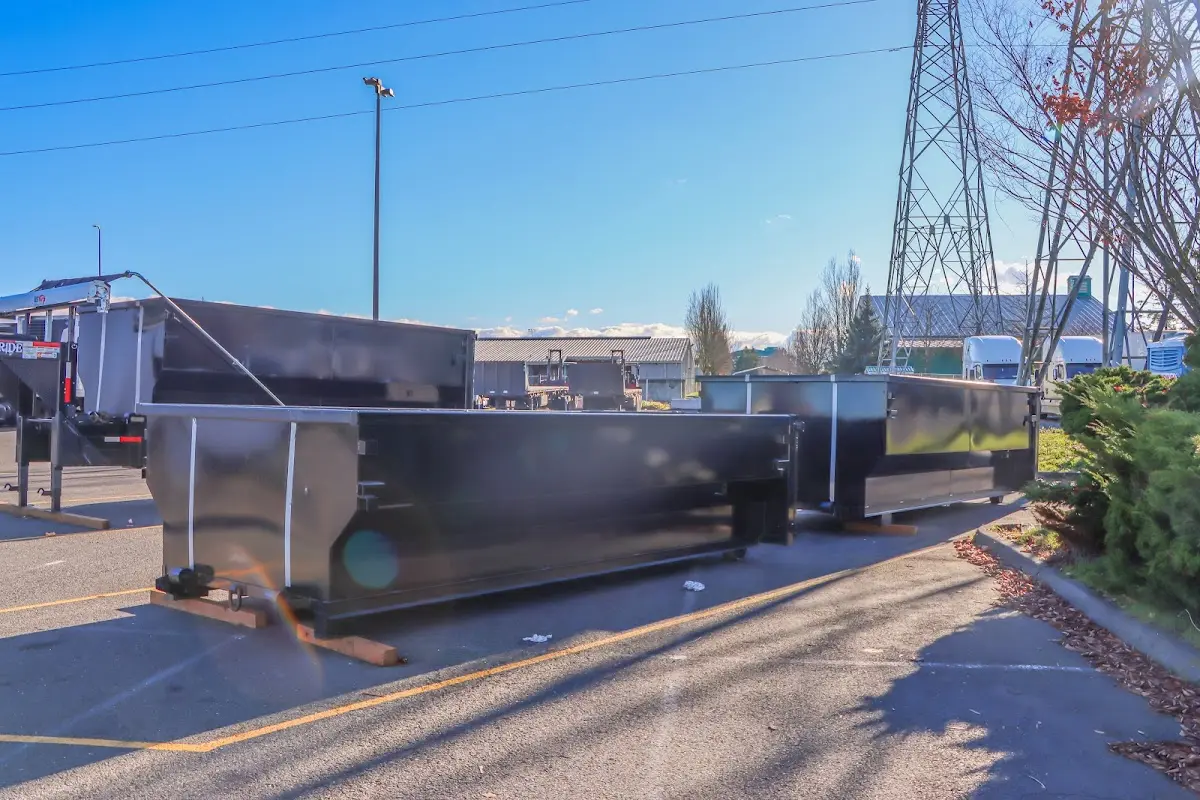 Roll-off dumpster ready for waste disposal at job site for Construction Dumpster Rental in Monroe
